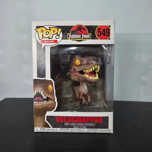 Funko Pop! Movies: Jurassic Park - Velociraptor vinyl figure, specifically number 549 from the 25th Anniversary collection.