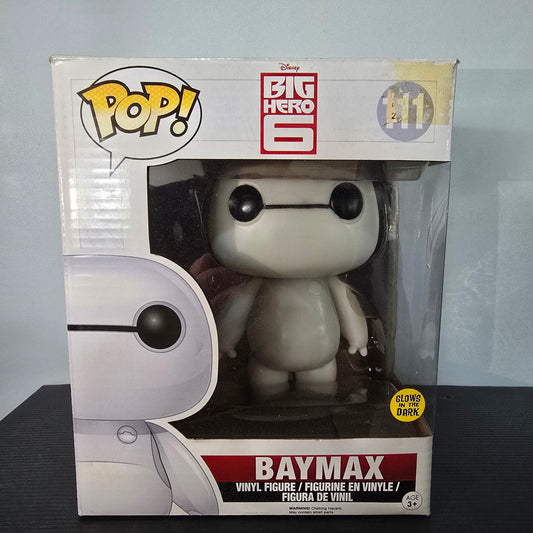 Funko Pop! Vinyl figure of Baymax from Disney's Big Hero 6, specifically the #111 Glow in the Dark (GITD) version.