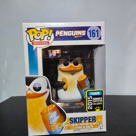 Funko Pop! Movies figure of Skipper from Penguins of Madagascar, specifically the #161 Skipper with Cheezy Dibbles variant, which was a 2015 Summer Convention