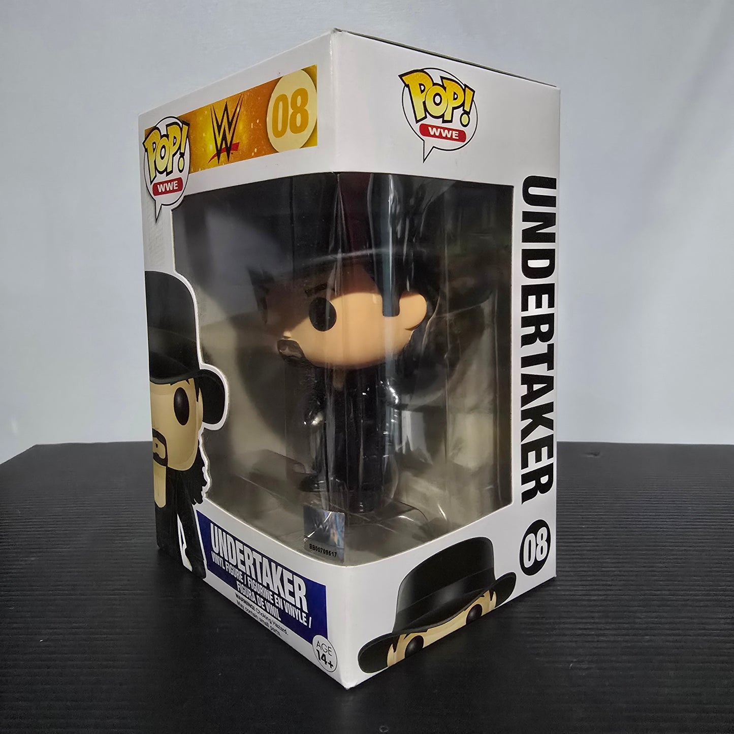Funko Pop! Vinyl figure of The Undertaker from WWE, specifically number 08 in the WWE Pop! series.