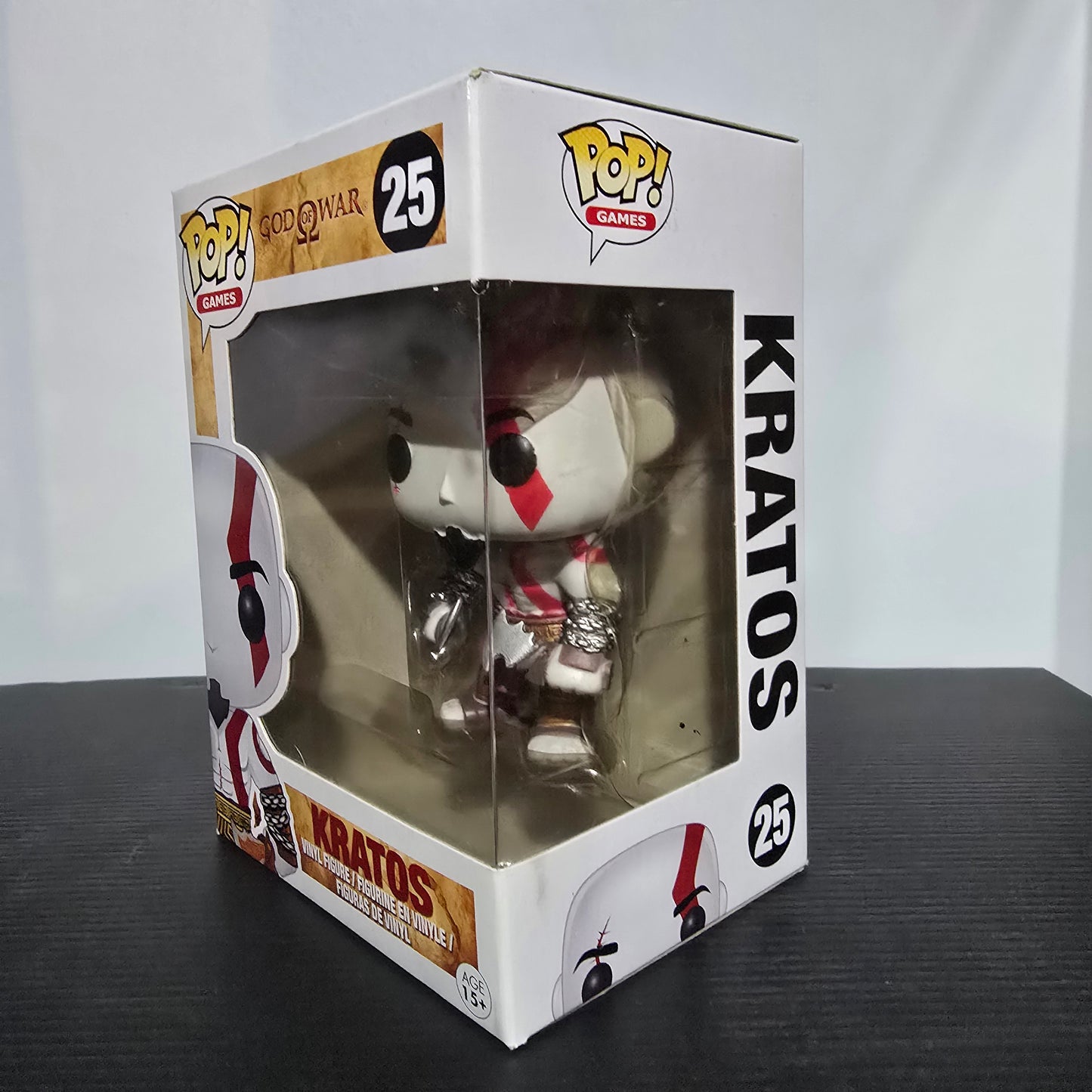 Funko Pop! Vinyl figure of Kratos from the God of War video game series, specifically the #25 figure.
