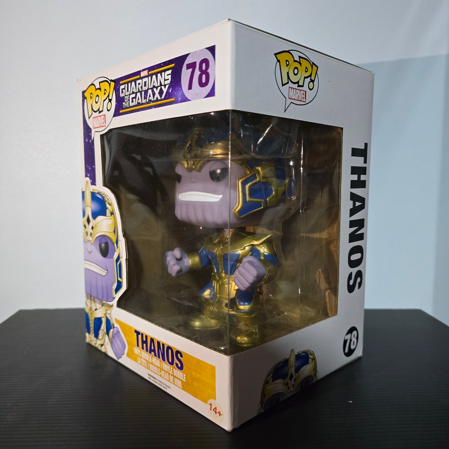 Funko Pop! vinyl figure of Thanos from Marvel's Guardians of the Galaxy, specifically number 78 in the series.