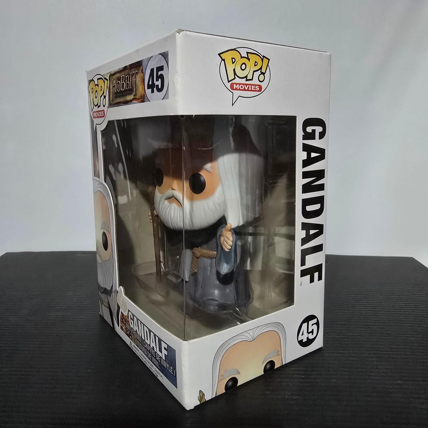Funko Pop! Movies vinyl figure of Gandalf from The Hobbit: The Desolation of Smaug, specifically numbered 45 in the Pop! Movies line.