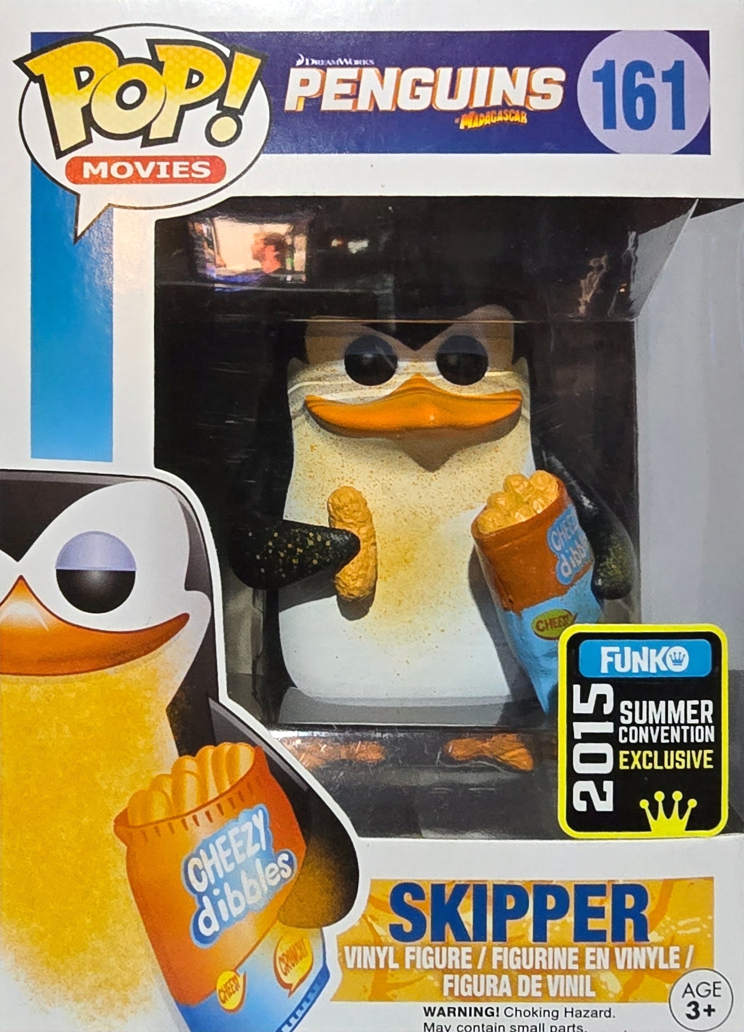 Funko Pop! Movies figure of Skipper from Penguins of Madagascar, specifically the #161 Skipper with Cheezy Dibbles variant, which was a 2015 Summer Convention
