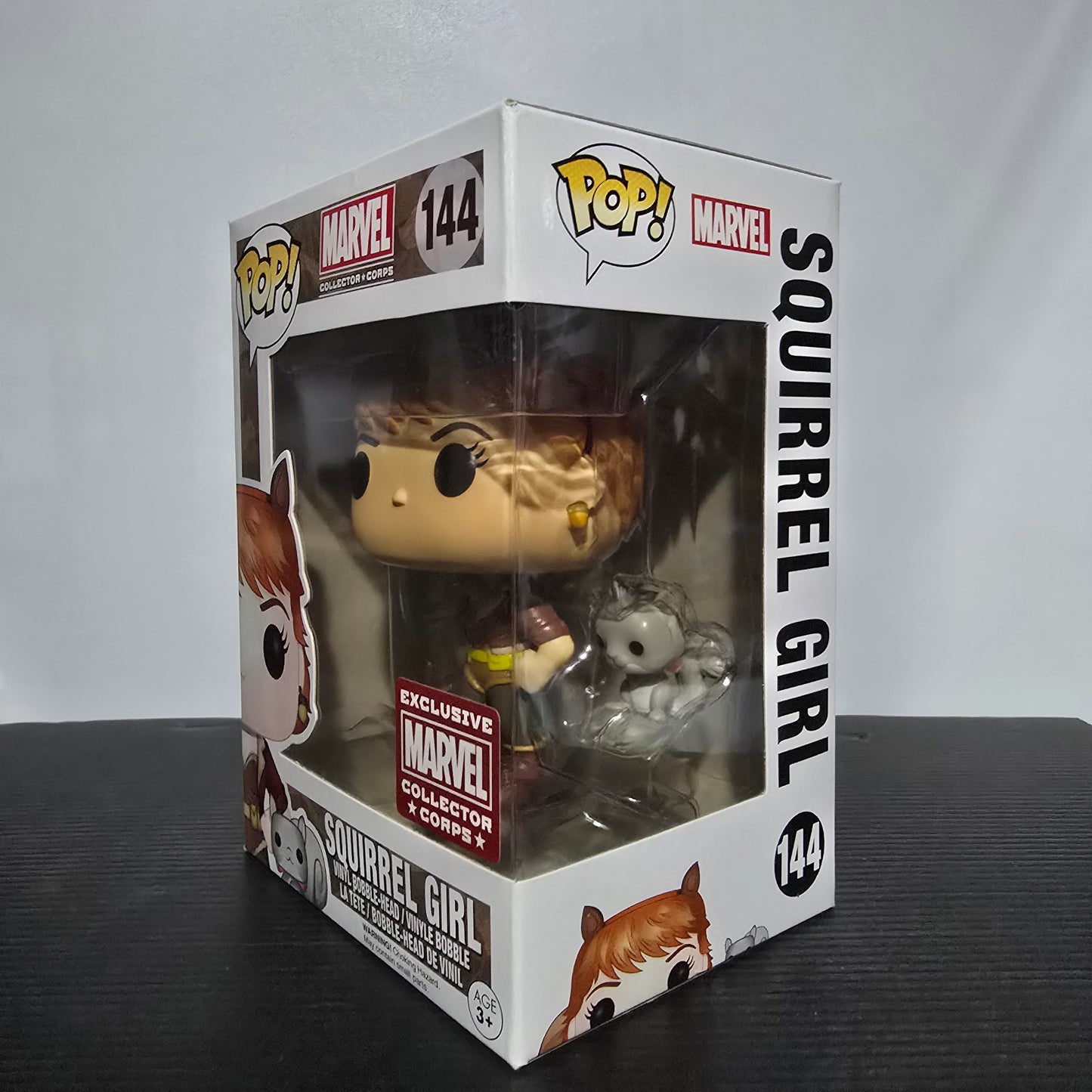 Funko Pop! Marvel Squirrel Girl vinyl bobble-head, number 144 in the Pop! Marvel Collector Corps series.