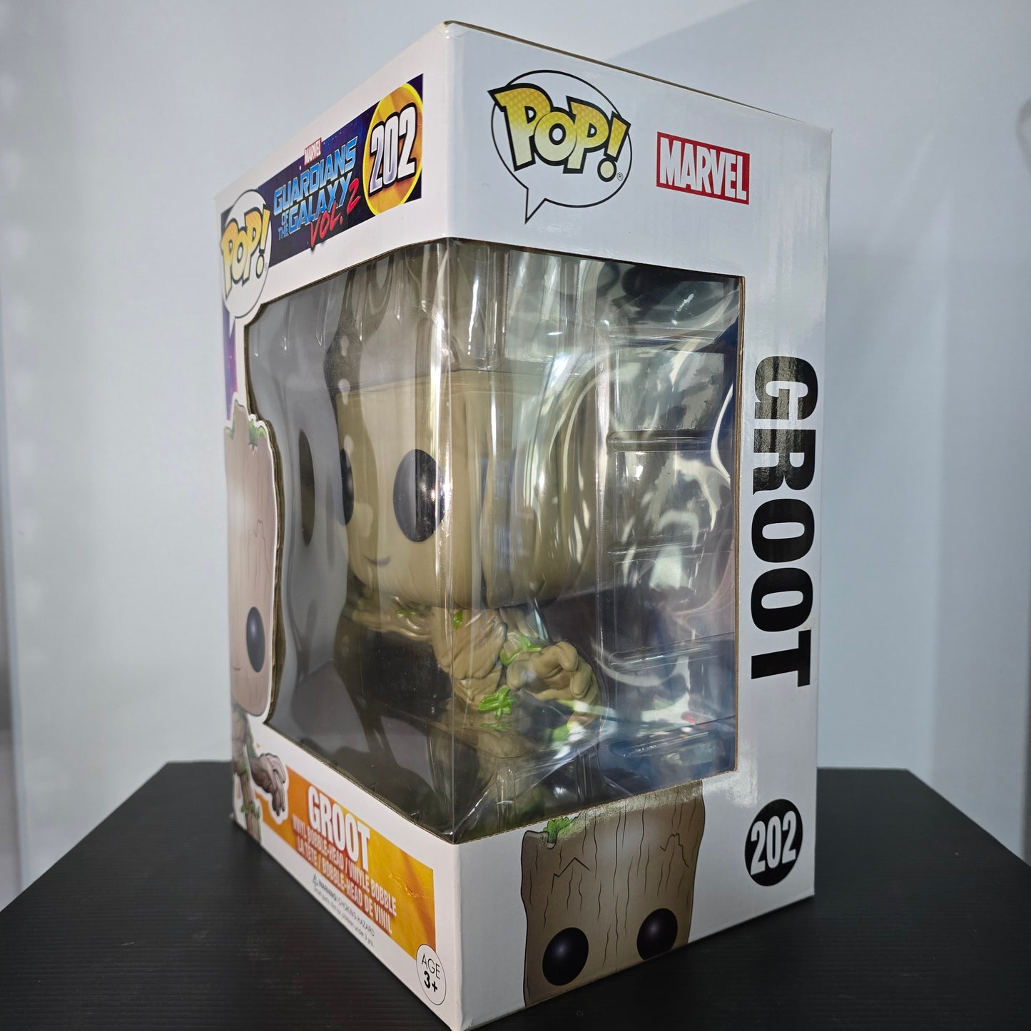 Funko Pop! vinyl bobble-head figure of Groot from Marvel's Guardians of the Galaxy Vol. 2.