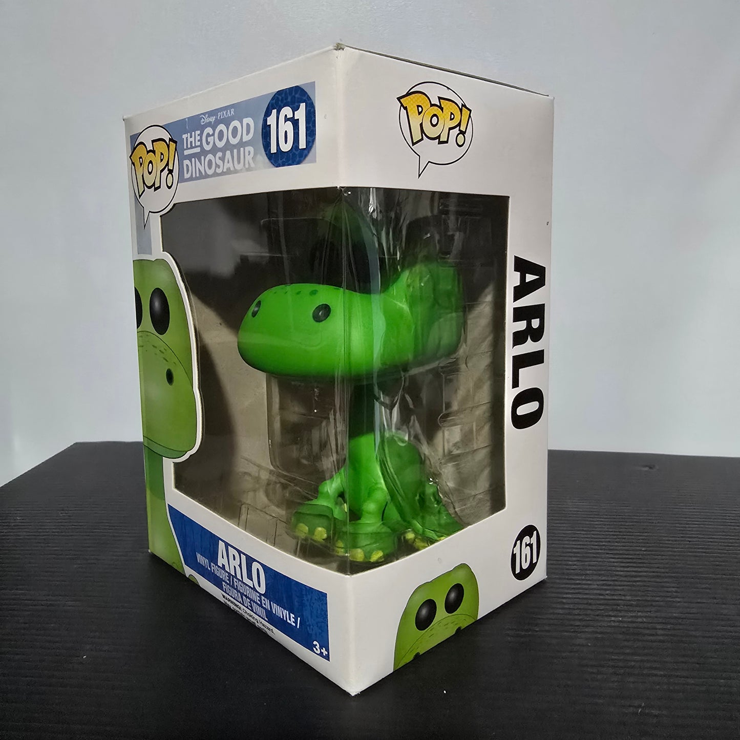 Funko Pop! Vinyl Figure of Arlo, the main character from Disney/Pixar's movie The Good Dinosaur.